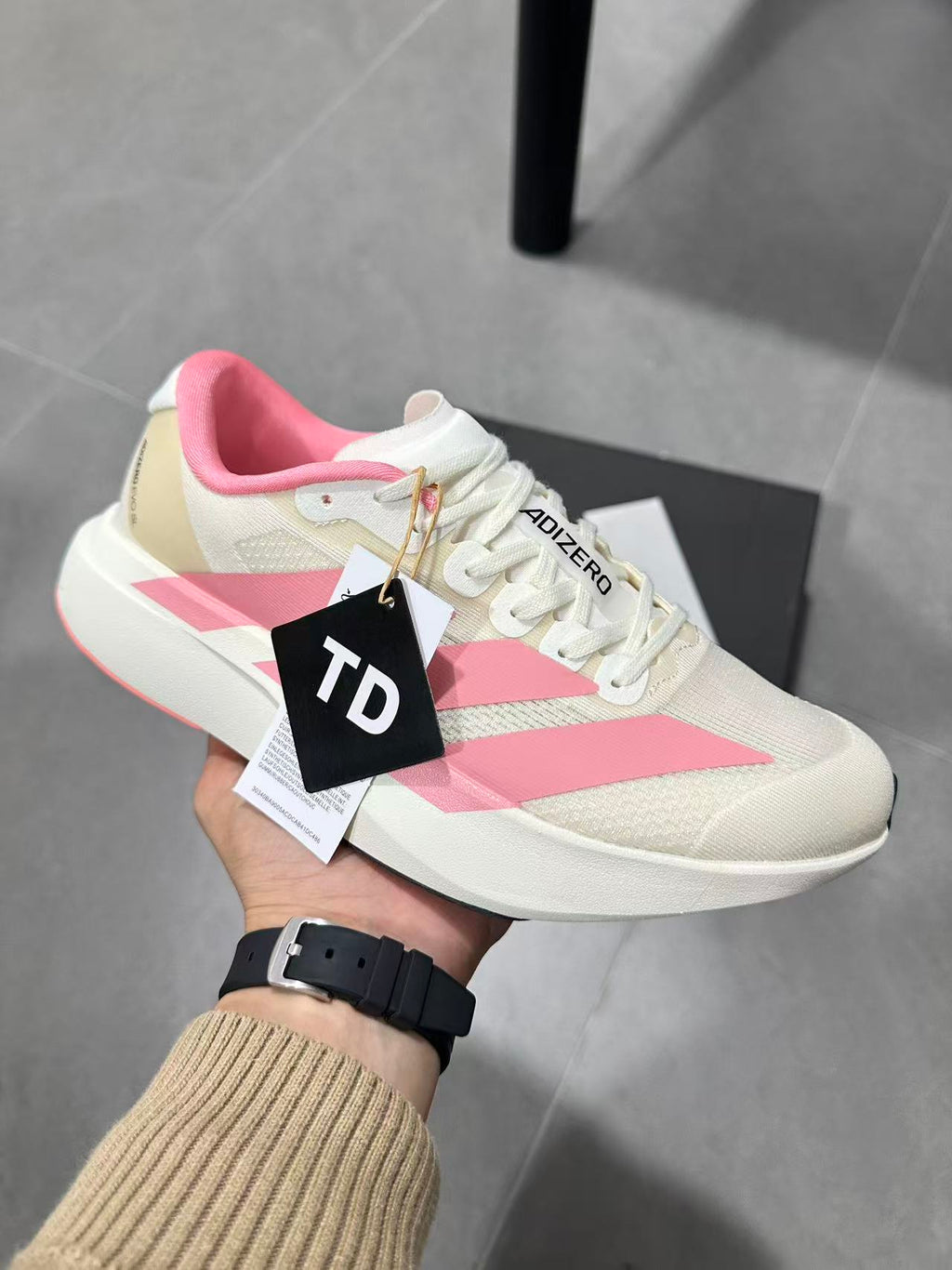 adidas Adizero Lightstrike Pro Running Shoes in White Pink - product image from the listing.