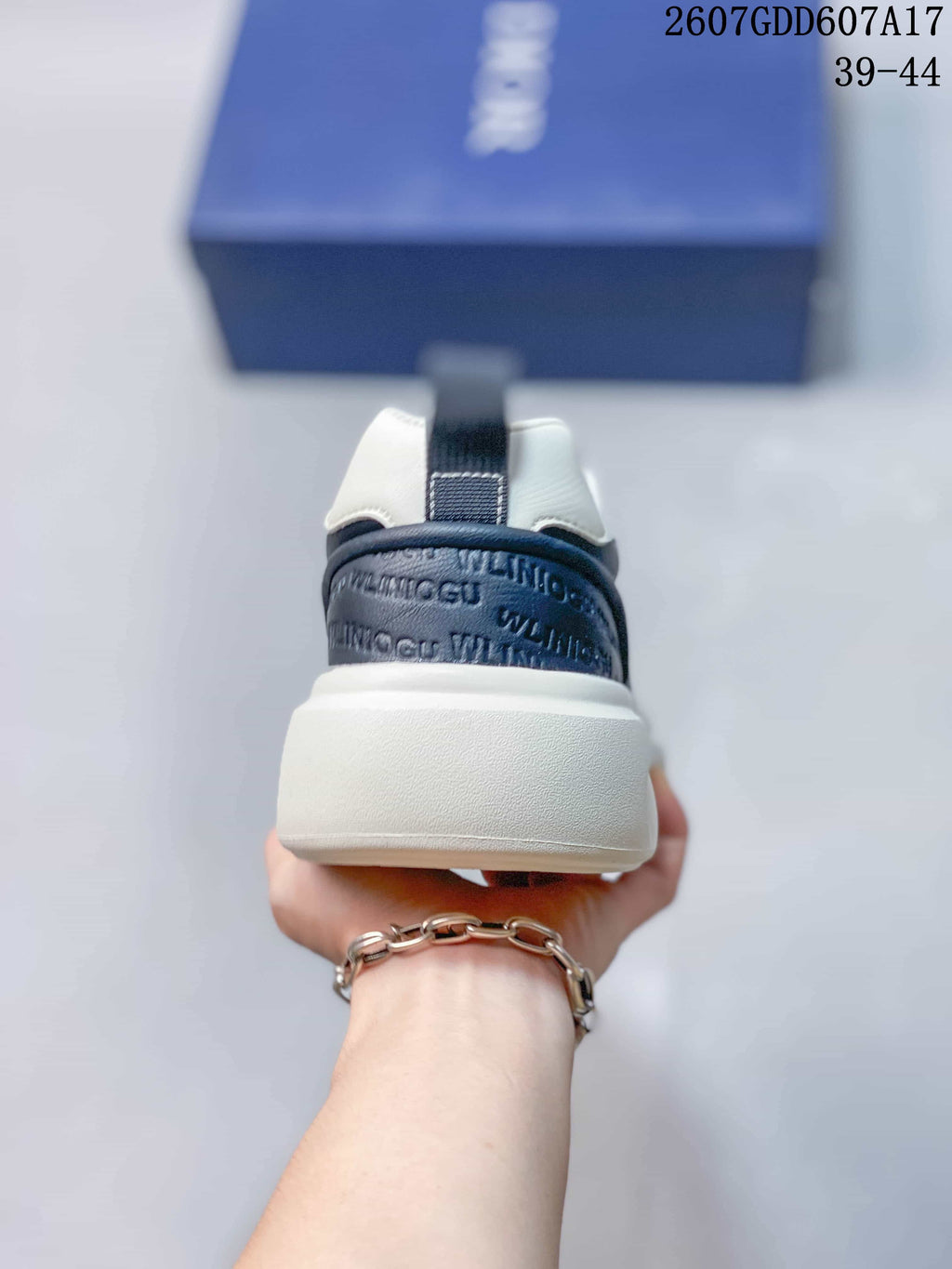 Dior 2607GDD607A17 Low-Top Sneakers in Navy White - product image from the listing.