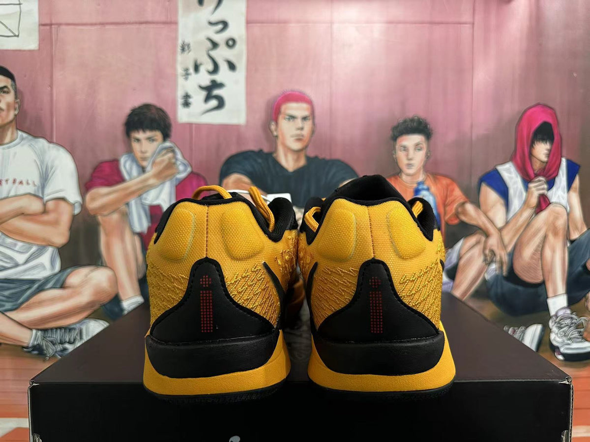 Nike Basketball Shoes in Black and Yellow - product image from the listing.
