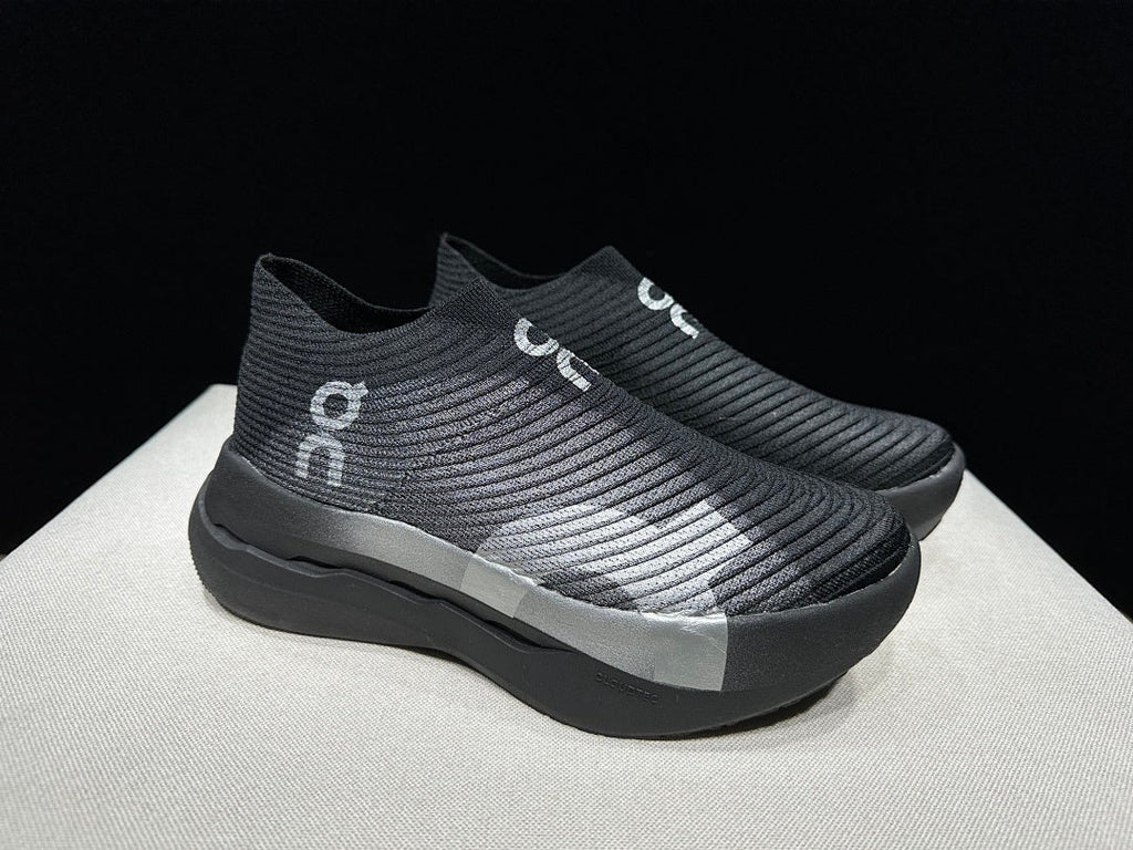On Cloudboom Strike LS Running Shoes in Black Silver - product image from the listing.