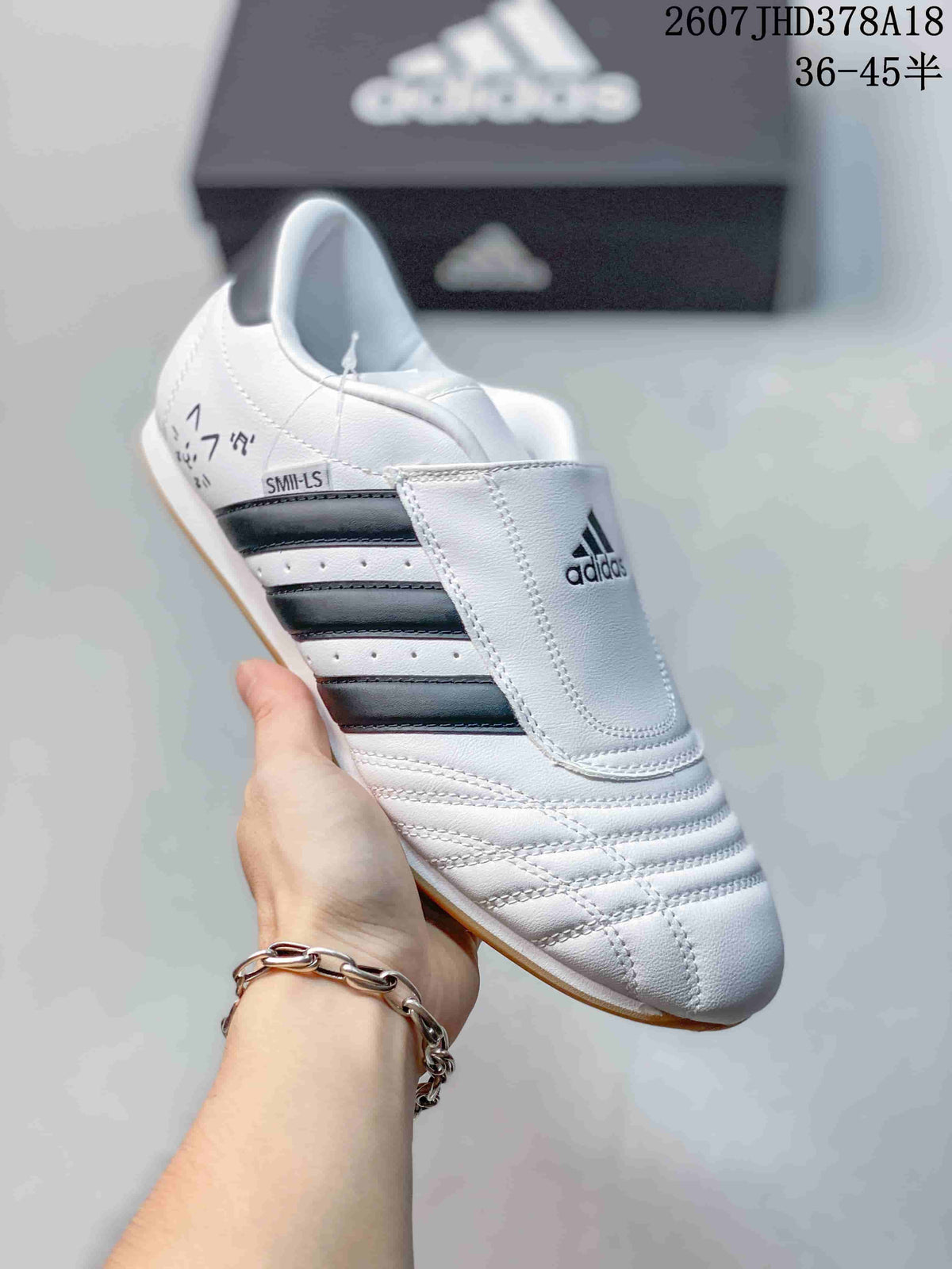 adidas Taekwondo SMIL-LS Low-Top Sneakers in White Navy - product image from the listing.