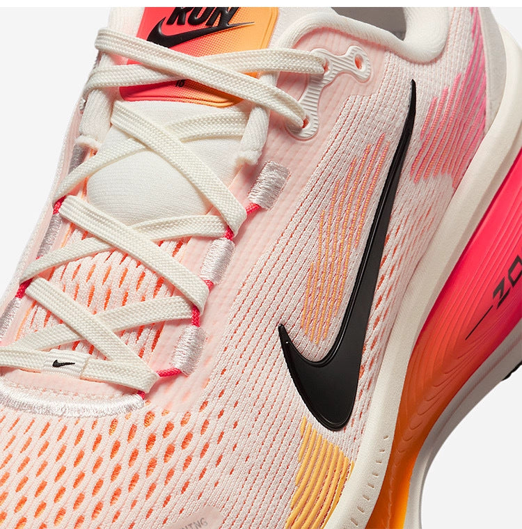 Nike Vomero 18 Running Shoes HM6804-100 in White Orange - product image from the listing.
