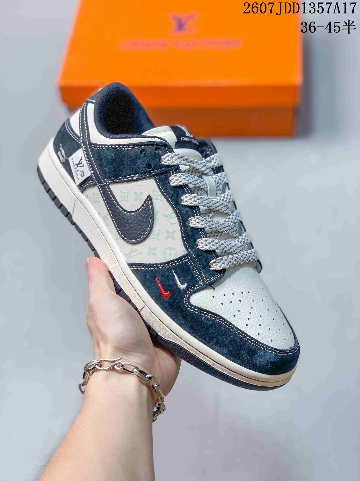 Nike SB Dunk Low Sneakers in Navy and White 2607JDD1357A17 - product image from the listing.