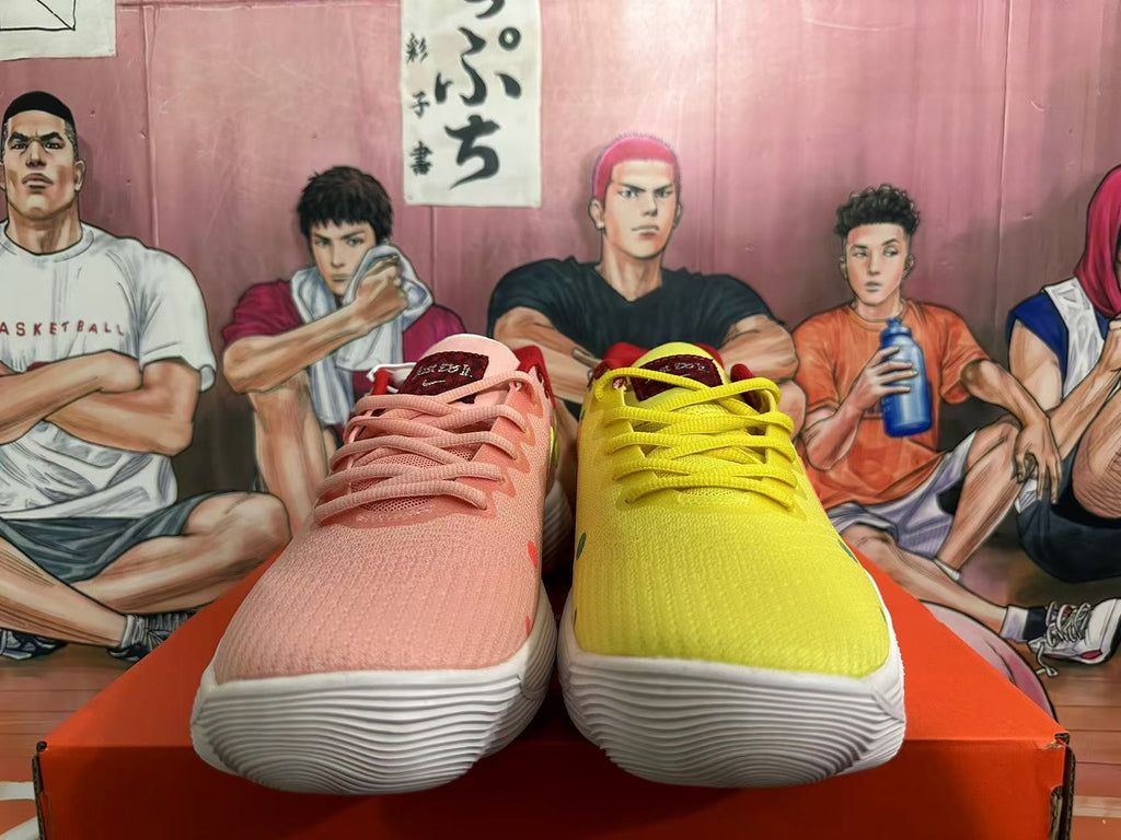 Pink and Volt Yellow Nike Basketball Shoes - product image from the listing.