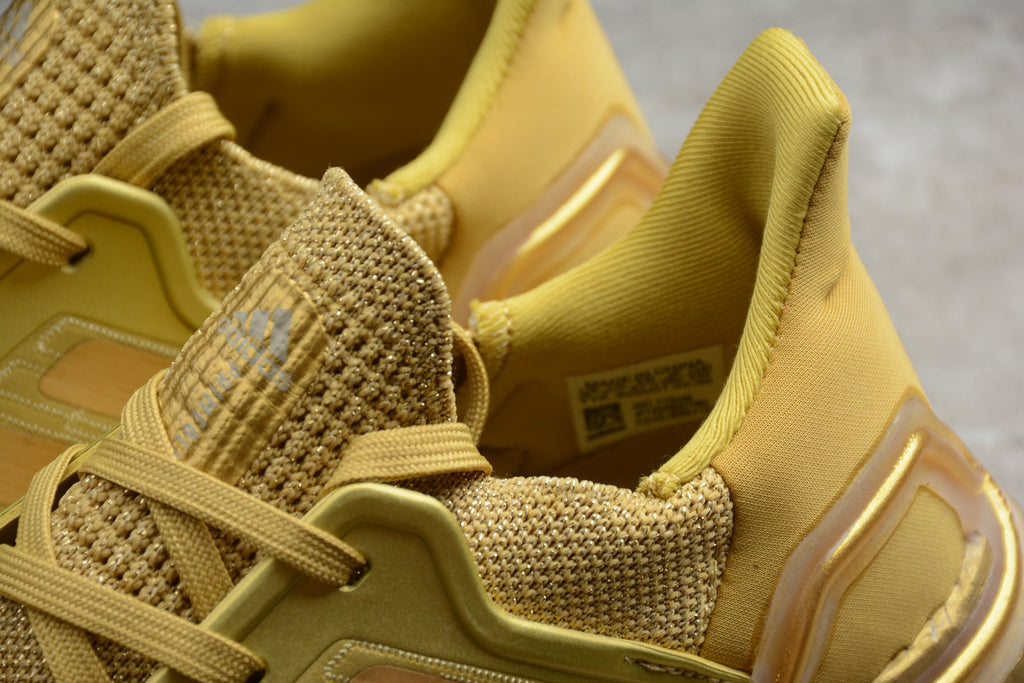 Adidas UltraBOOST 20 Consortium 6.0 Running Shoes in Gold FY3448 - product image from the listing.
