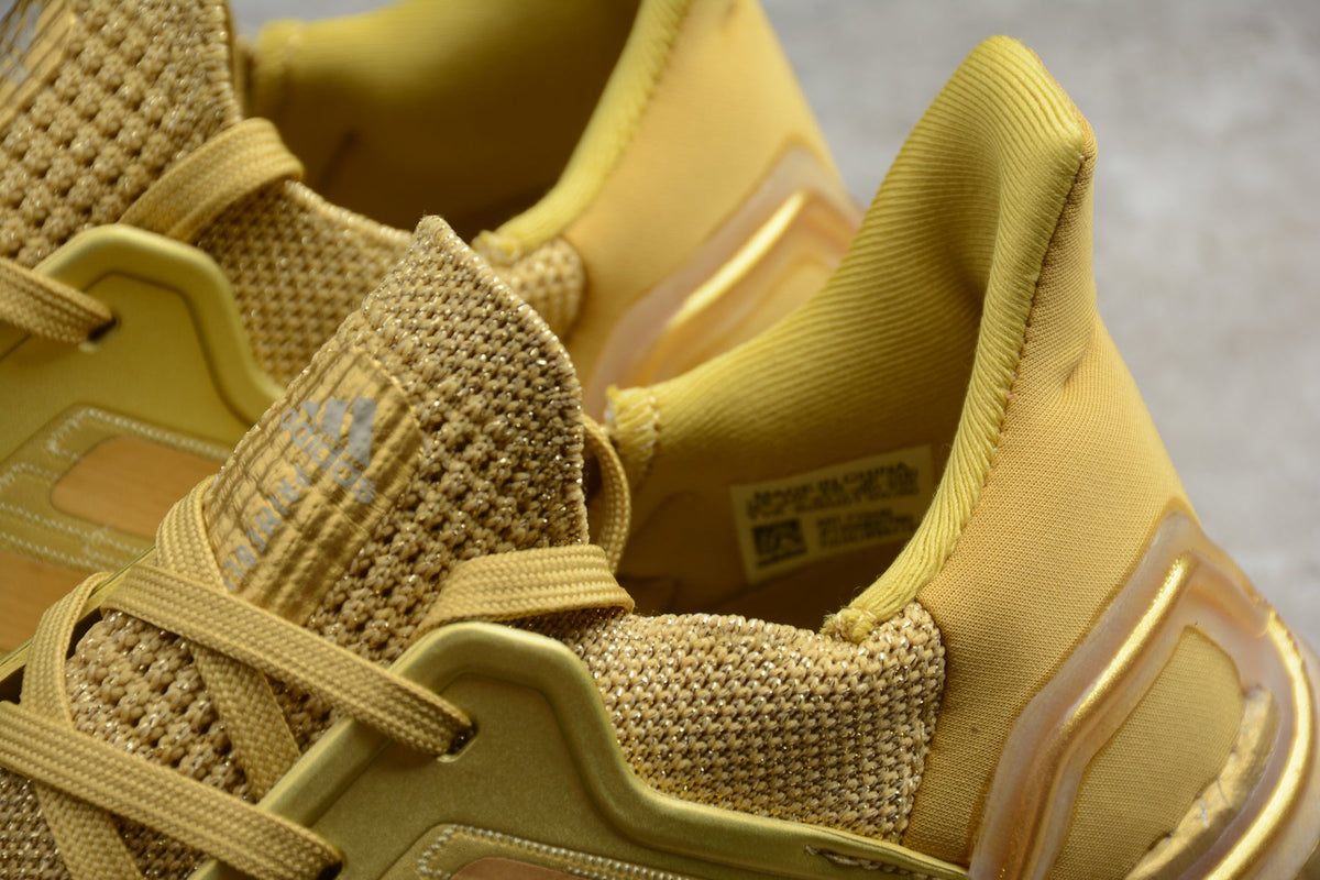 Adidas UltraBOOST 20 Consortium 6.0 Running Shoes in Gold FY3448 - product image from the listing.