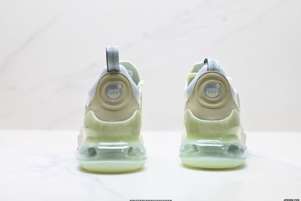 Light Green and White Nike Air Zoom Sneakers - product image from the listing.