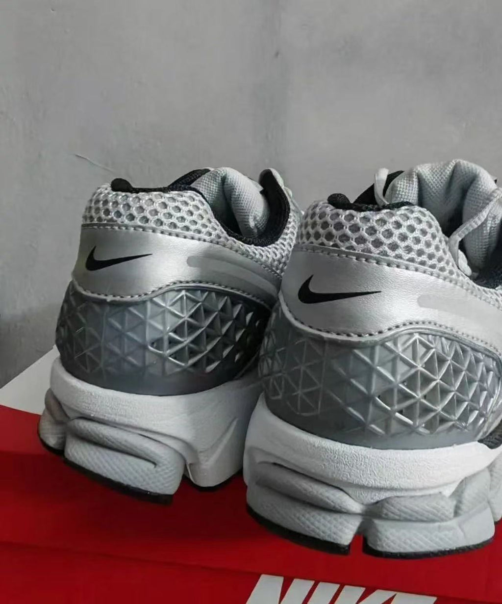 Nike Air Max 96 Sneakers in Silver Gray and Black - product image from the listing.