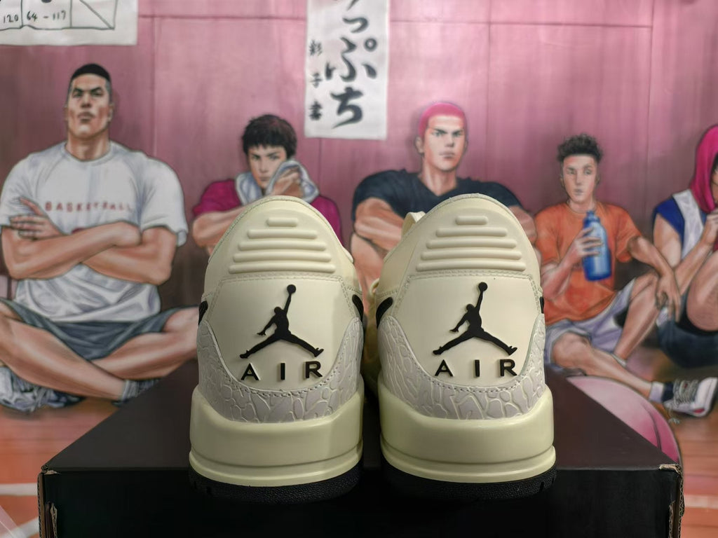 Cream and Black Jordan Legacy 312 Low Sneakers - product image from the listing.