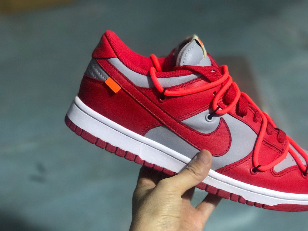 Nike Dunk Low LTHR / OW Sneakers in Red Gray CT0856-600 - product image from the listing.