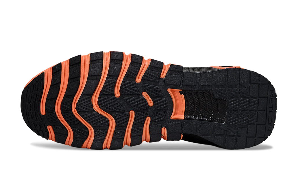Orange and Black Nike Free Sneakers - product image from the listing.