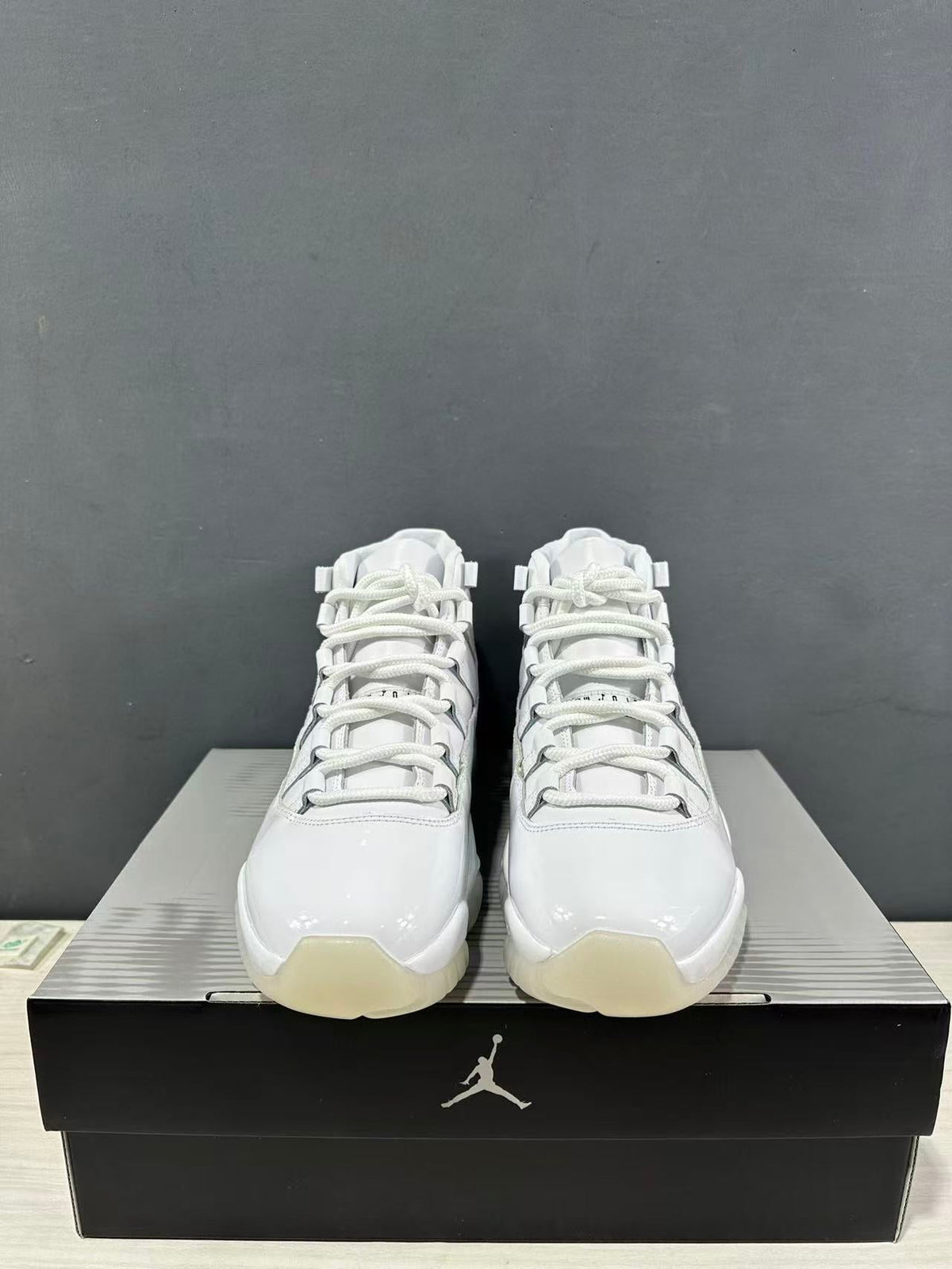 Air Jordan 11 Comme des Garçons White Sneakers IV7639-100 - product image from the listing.