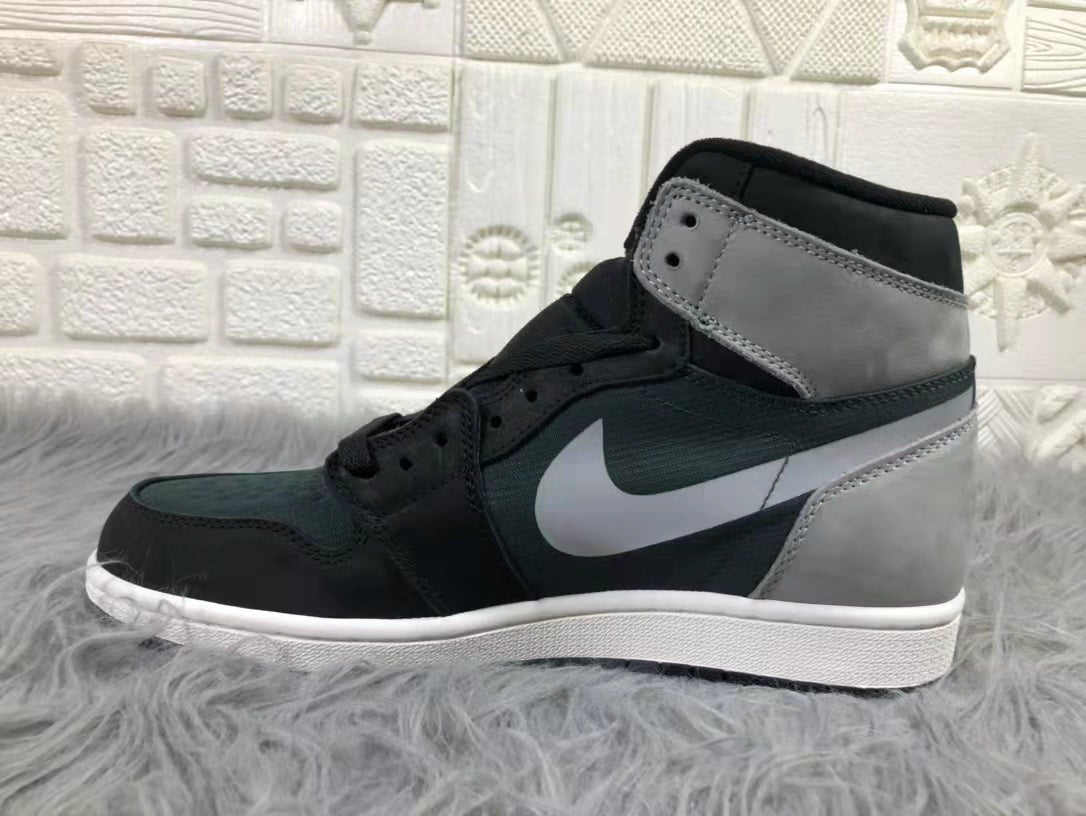 Air Jordan 1 Element Gore-Tex High-Top Sneakers in Black Grey - product image from the listing.