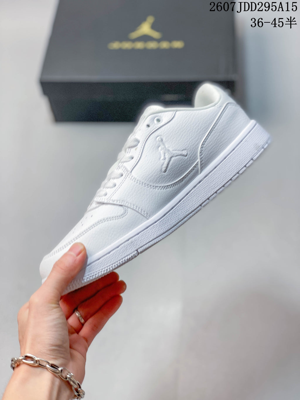 Nike Air Jordan 1 Low Sneakers in White 2607JDD295A15 - product image from the listing.