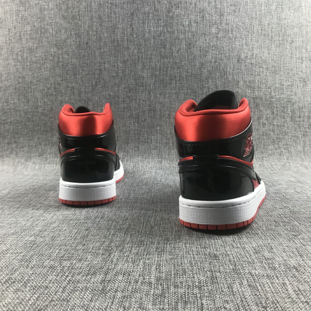 Air Jordan 1 Mid Sneakers in Black Red White BQ6472-600 - product image from the listing.