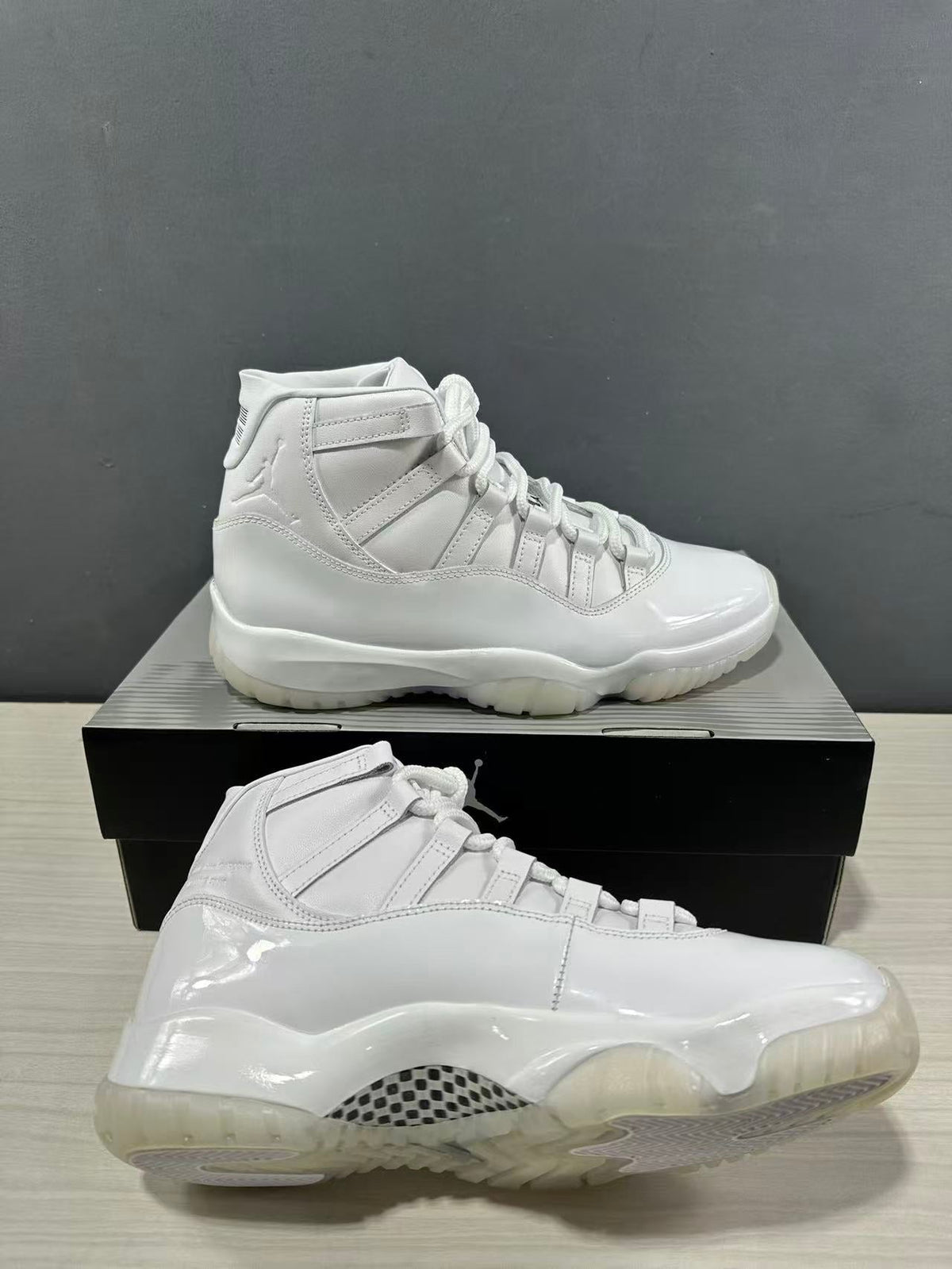 Air Jordan 11 Comme des Garçons White Sneakers IV7639-100 - product image from the listing.