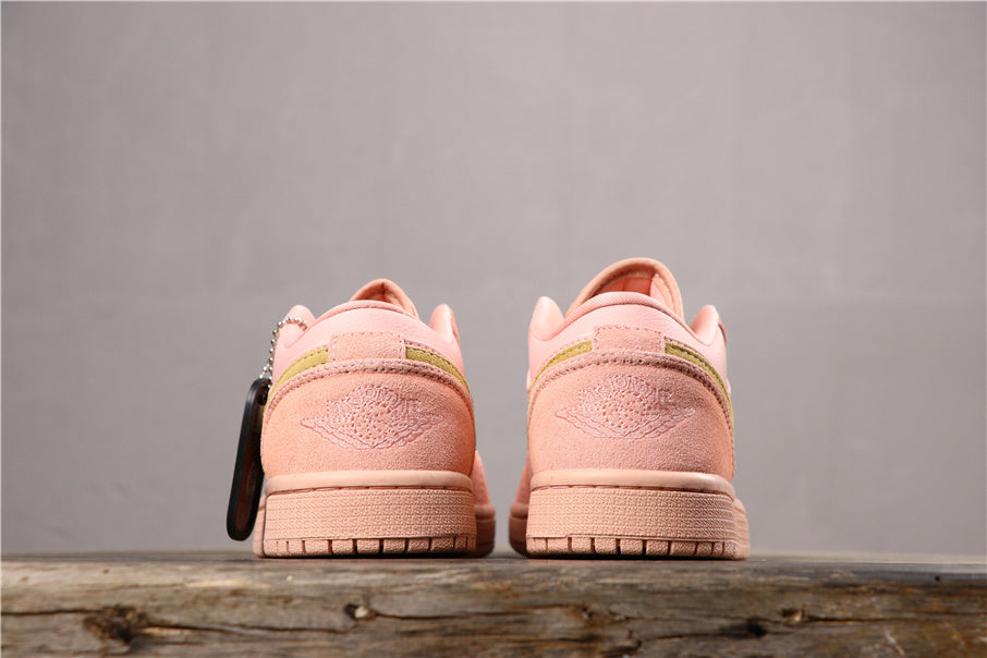 Air Jordan 1 Low Sneakers in Coral Pink CJ9216-676 - product image from the listing.