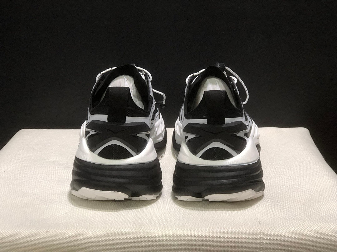 HOKA Stinson One 7 Black and White Trail Trainers - product image from the listing.