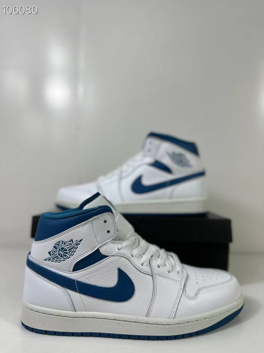 Air Jordan 1 Mid White Blue FN5215-141 Sneakers - product image from the listing.