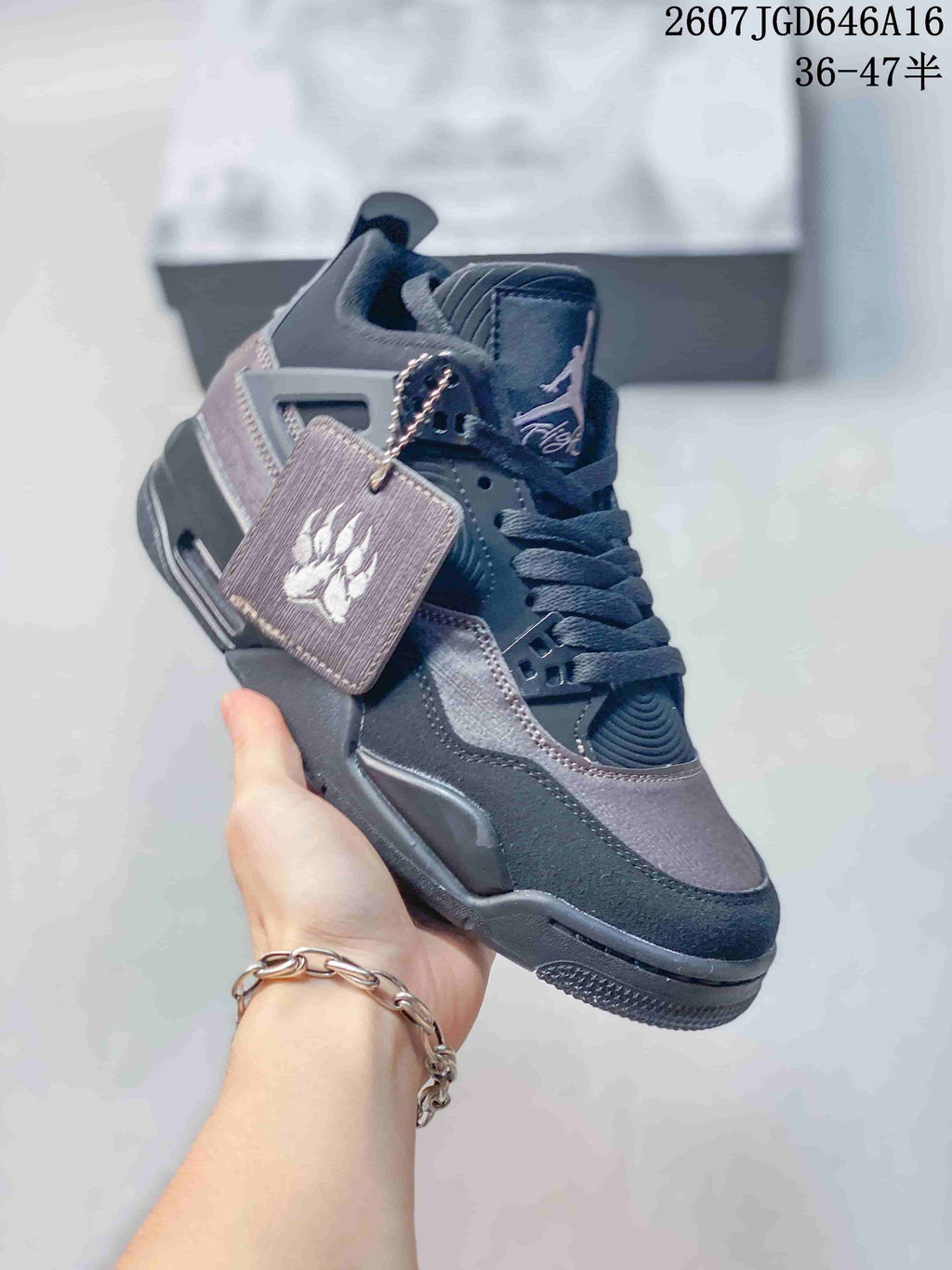 Air Jordan 4 Retro Sneakers Charcoal Black JA8136 - product image from the listing.