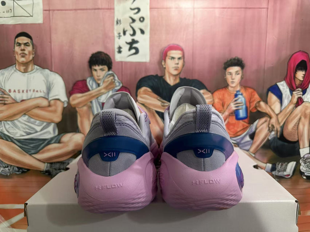 Gray and Pink Nike Kyrie Low Basketball Shoes - product image from the listing.