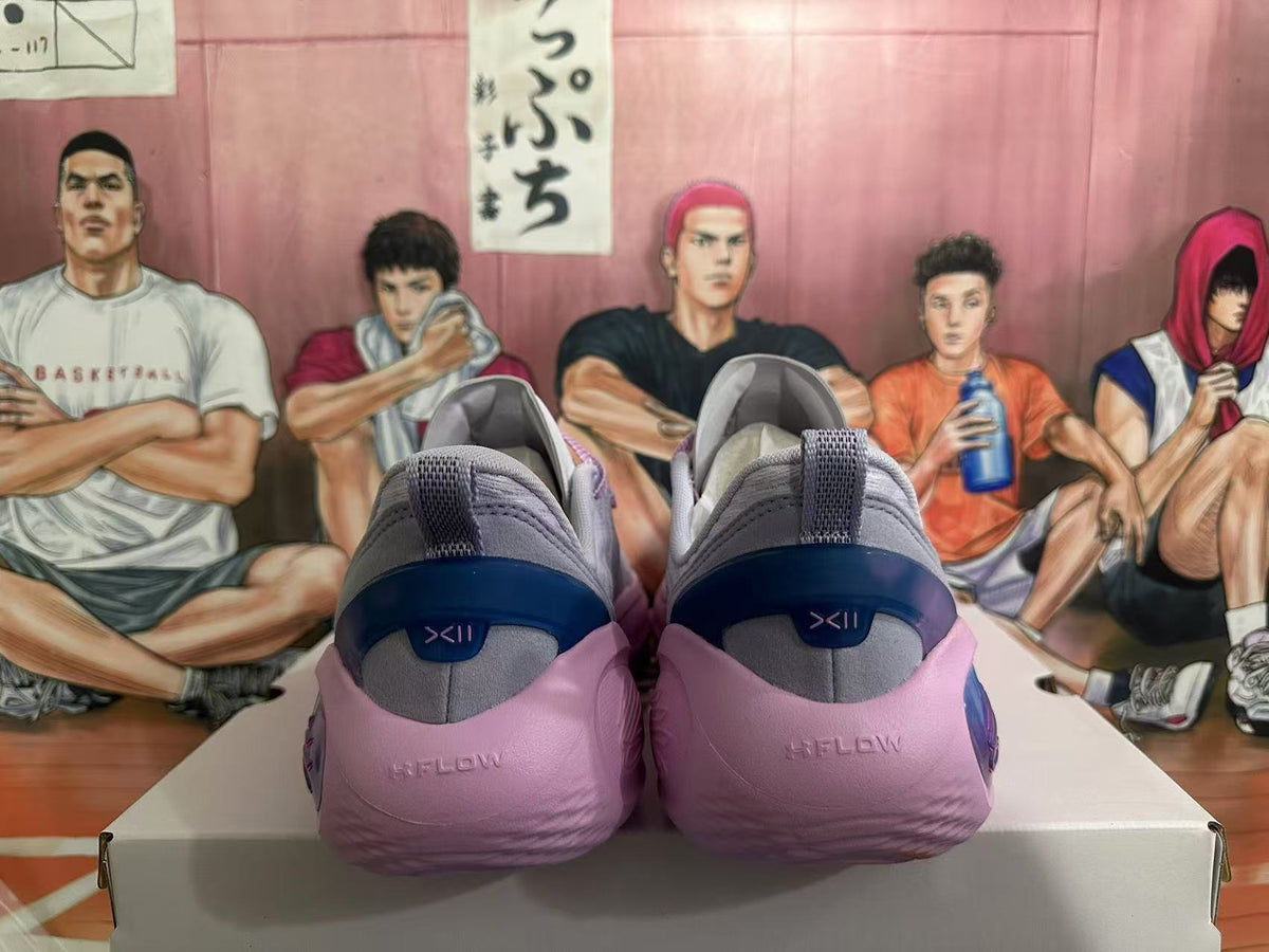Gray and Pink Nike Kyrie Low Basketball Shoes - product image from the listing.