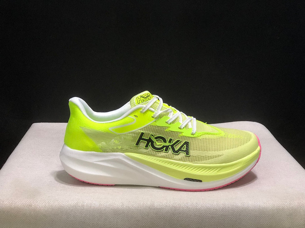 HOKA Rocket X 3 Running Shoes in Neon in Yellow and Pink - product image from the listing.