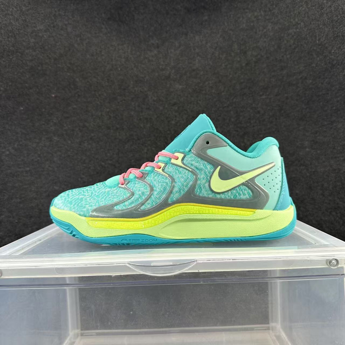 Turquoise and Volt Green Nike Basketball Shoes - product image from the listing.