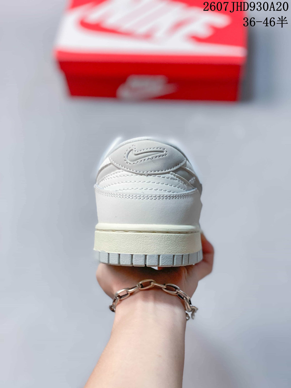 Nike Dunk Low Sneakers in Beige 07JHD930A20 - product image from the listing.
