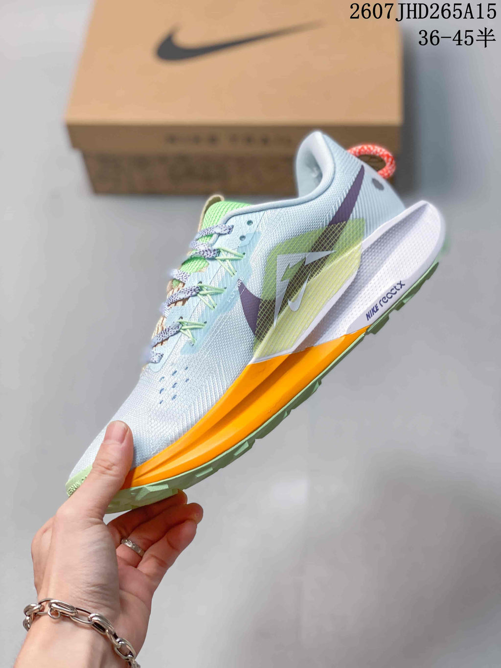 Nike Pegasus Trail 5 Trail Running Shoes in Blue Lime Orange - product image from the listing.
