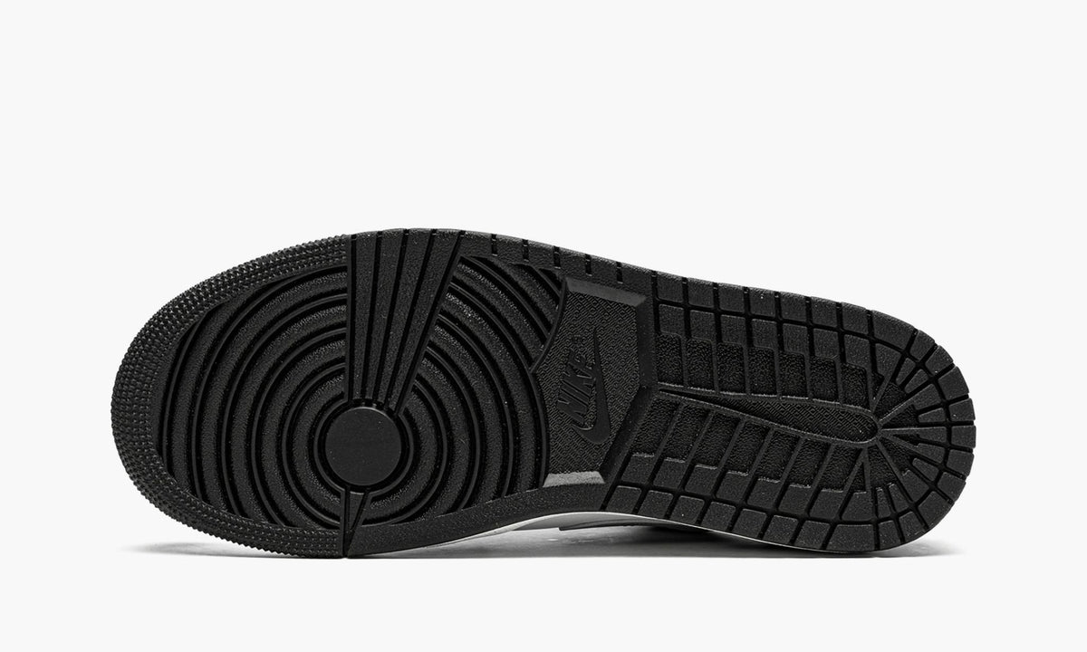 Air Jordan 1 Low Black / Particle in Grey - product image from the listing.
