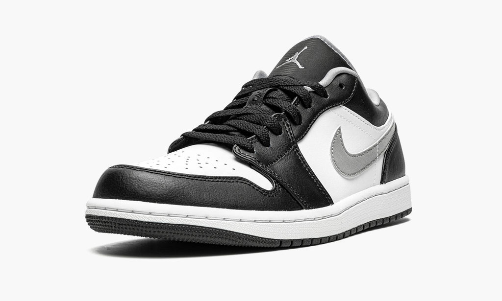 Air Jordan 1 Low Black / Particle in Grey - product image from the listing.