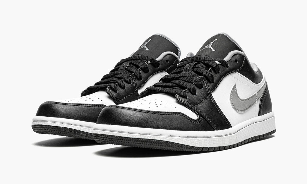 Air Jordan 1 Low Black / Particle in Grey - product image from the listing.