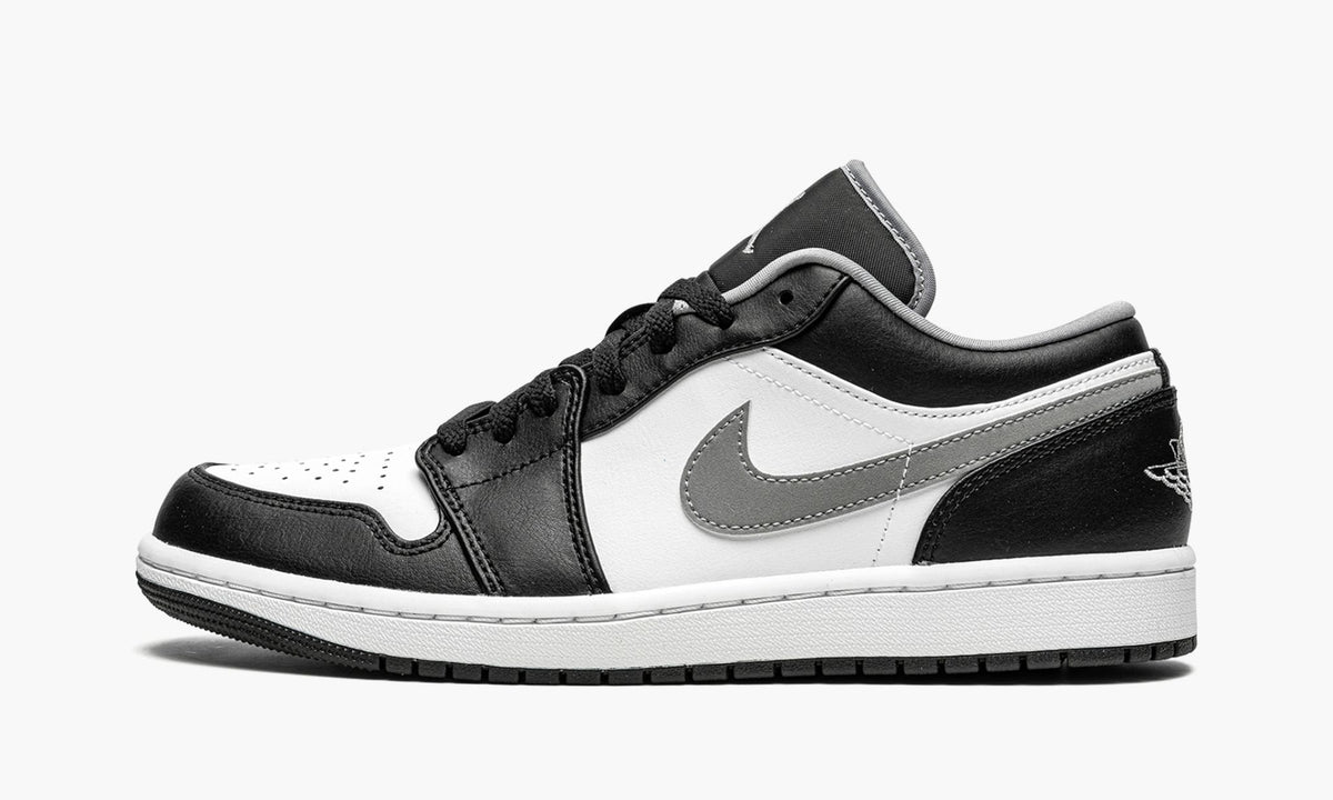 Air Jordan 1 Low Black / Particle in Grey - product image from the listing.