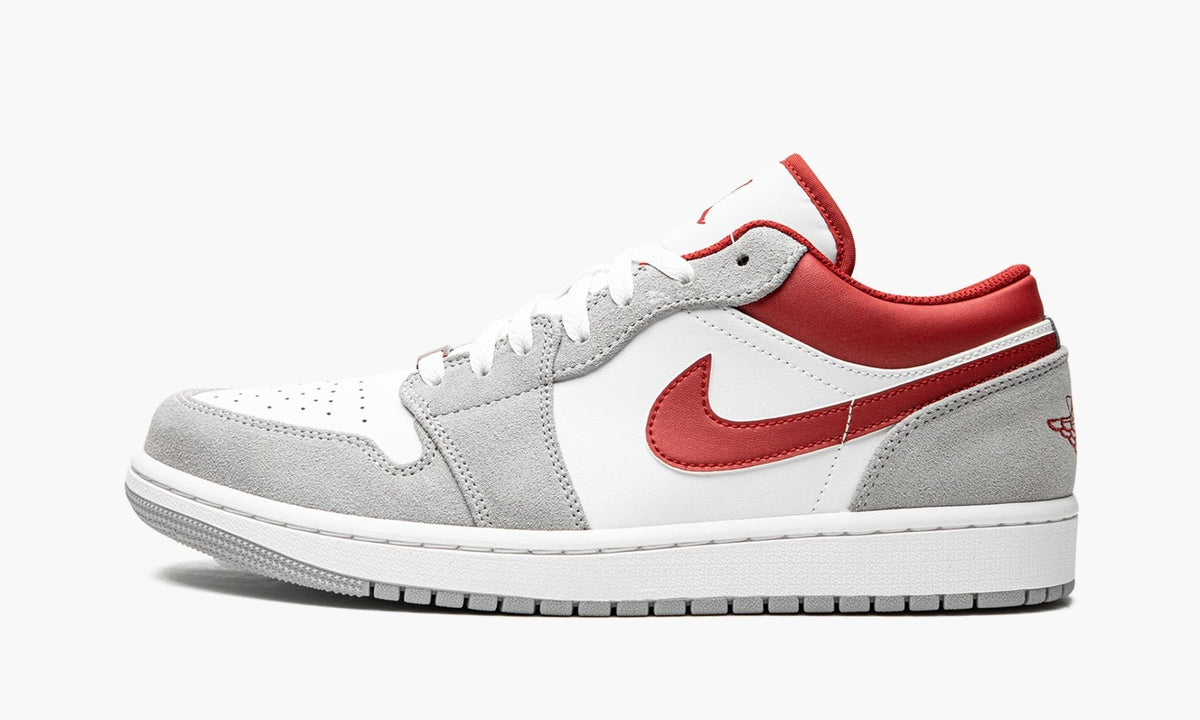 AIR JORDAN 1 LOW SE in White / Grey / Red - product image from the listing.