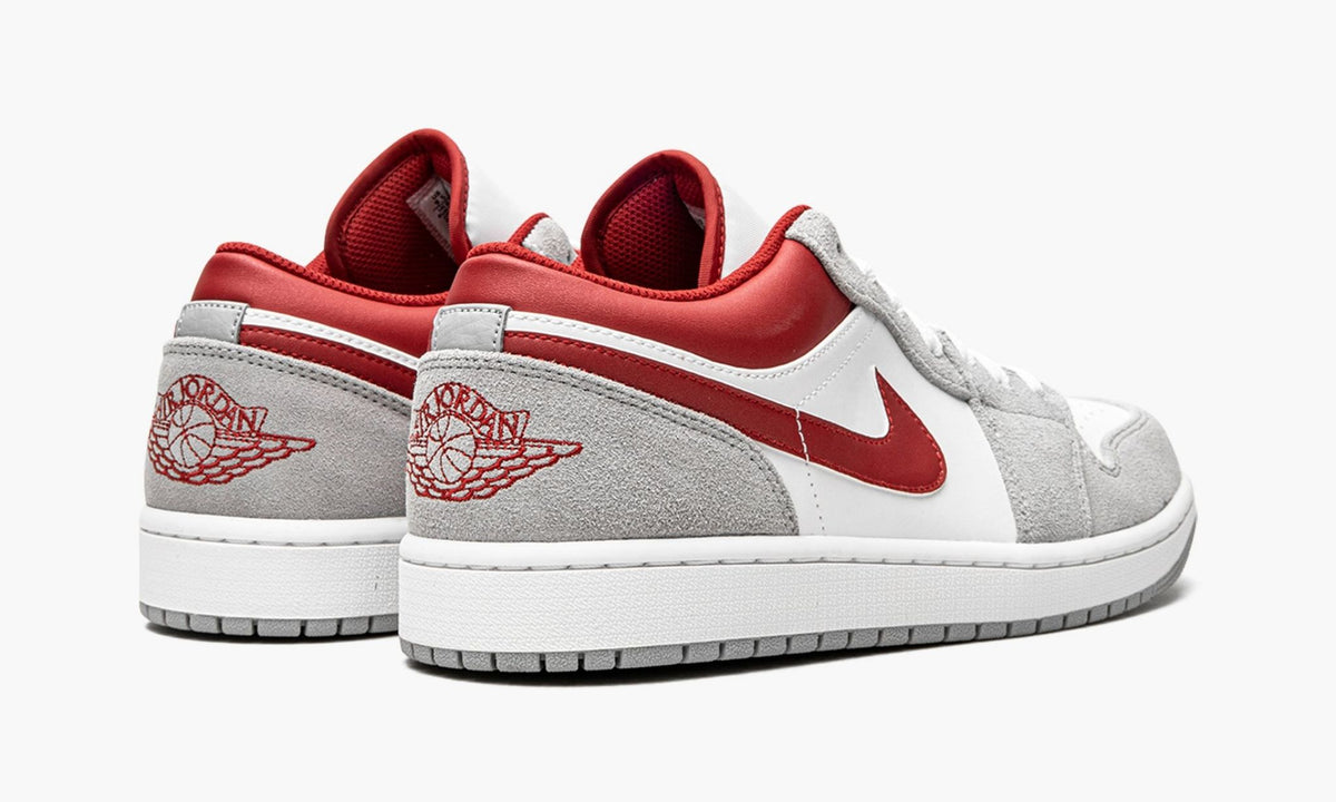 AIR JORDAN 1 LOW SE in White / Grey / Red - product image from the listing.