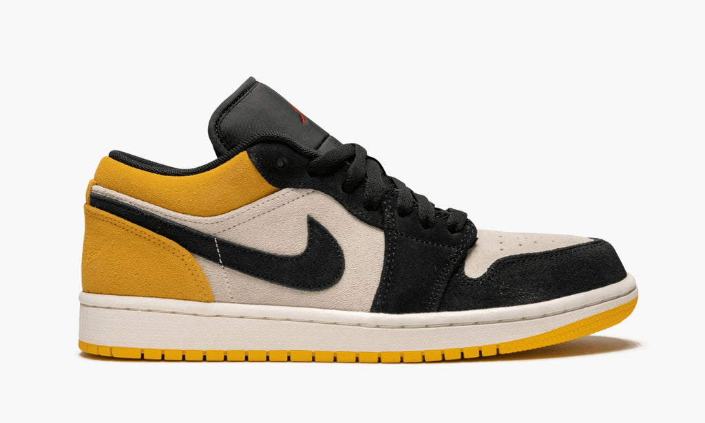 Air Jordan 1 Low in University Gold - product image from the listing.