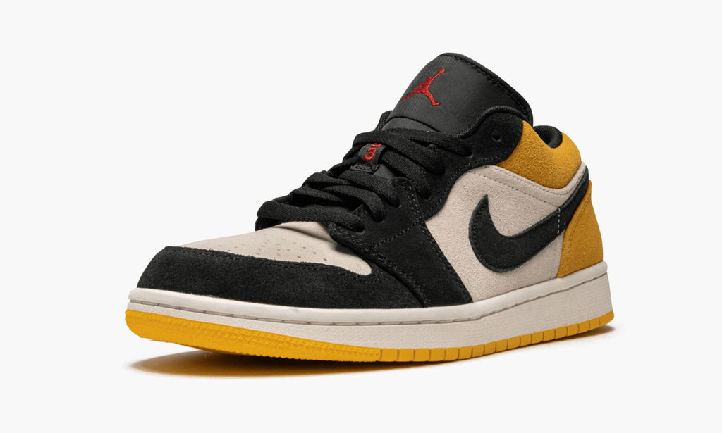 Air Jordan 1 Low in University Gold - product image from the listing.