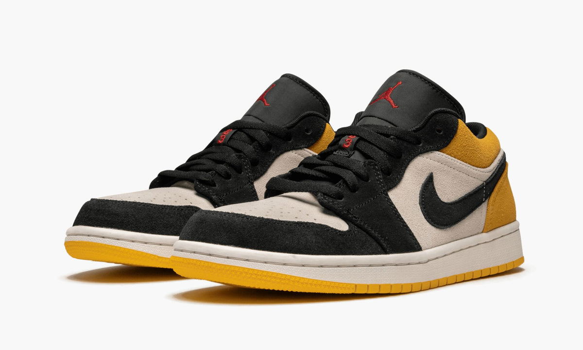 Air Jordan 1 Low in University Gold - product image from the listing.