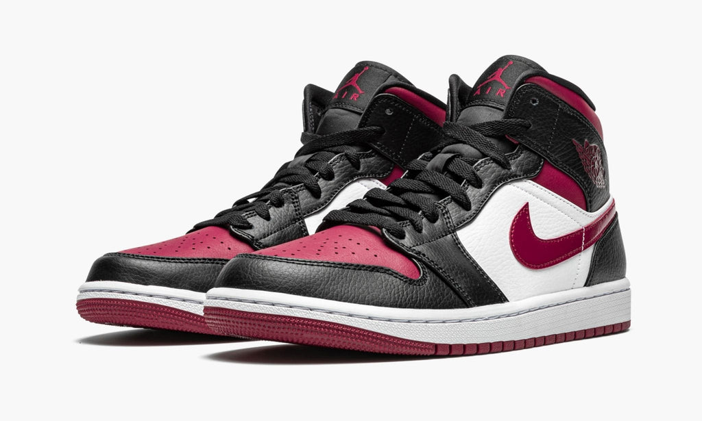 "Bred Toe" Air Jordan 1 Mid - product image from the listing.