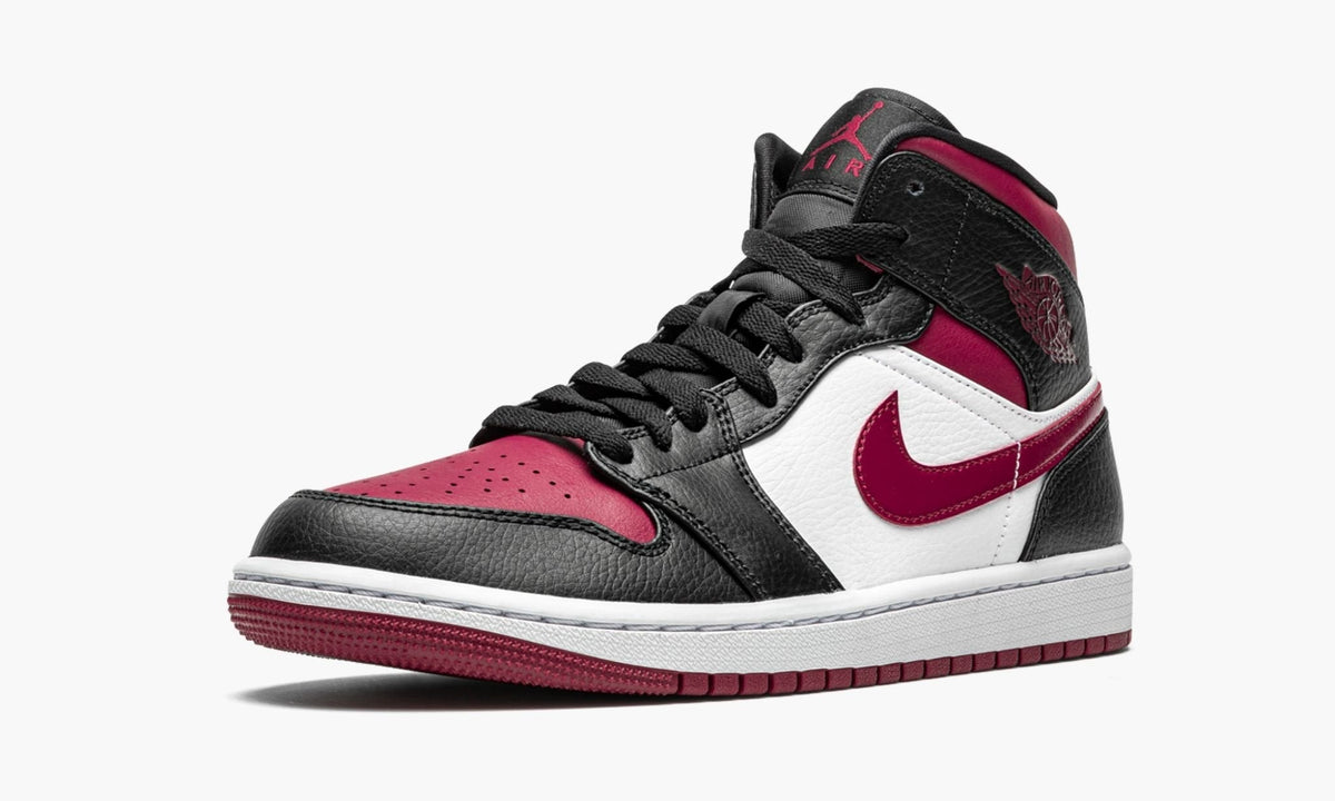 Bred Toe - Air Jordan 1 Mid - product image from the listing.