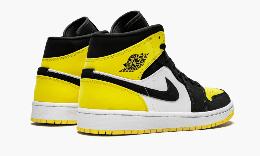 "Yellow Toe" Air Jordan 1 MID SE - product image from the listing.