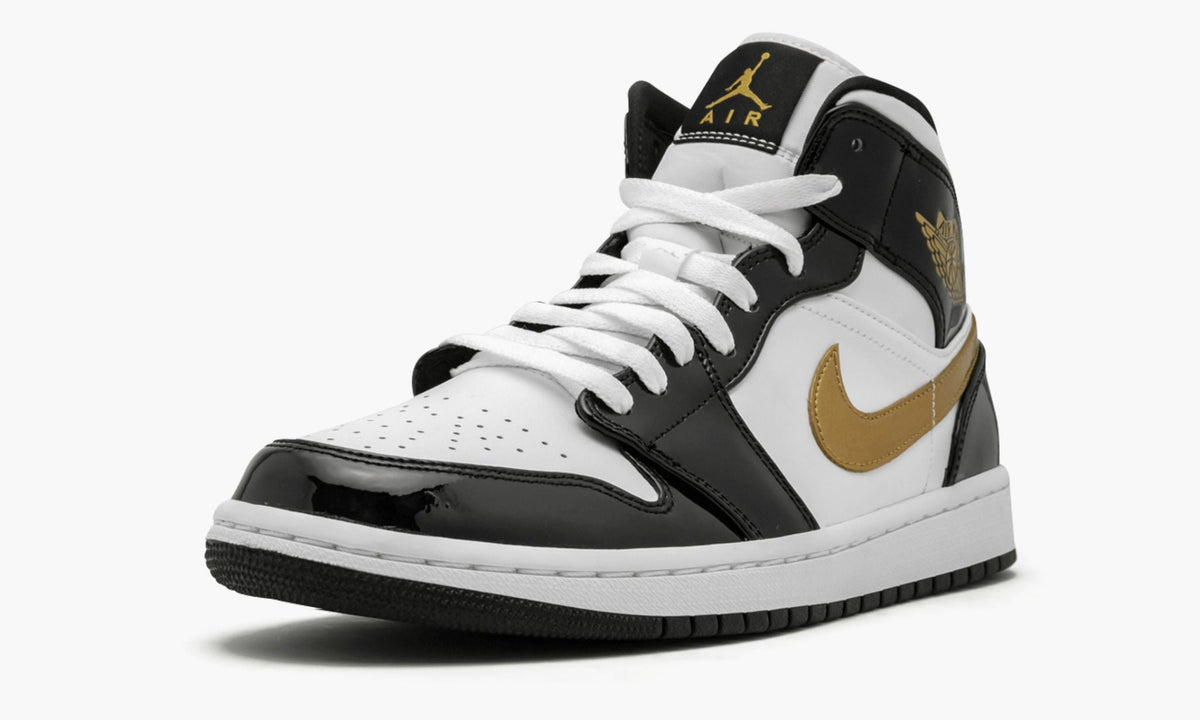Air Jordan 1 Mid SE Black Gold Patent in Leather - product image from the listing.