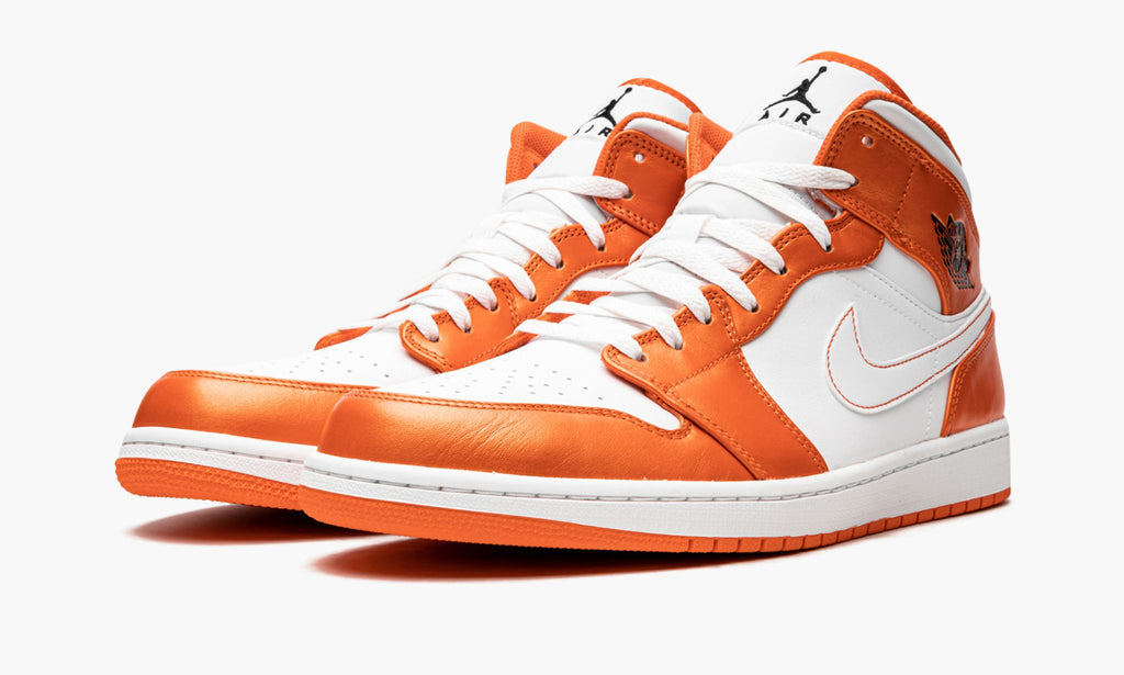 Air Jordan 1 Mid SE Electro in Orange - product image from the listing.