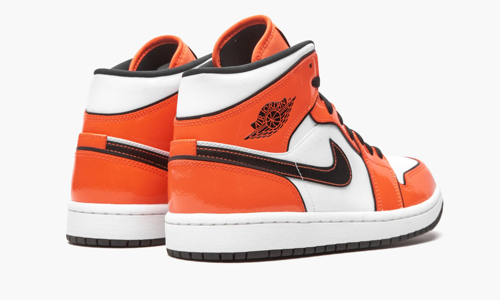 Air Jordan 1 Mid SE Turf in Orange - product image from the listing.