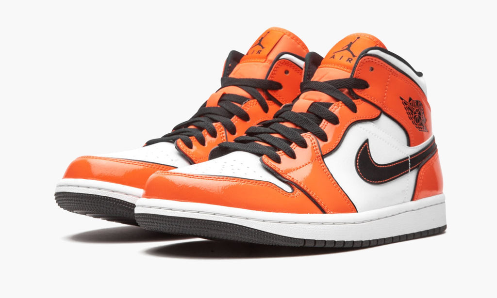 Air Jordan 1 Mid SE Turf in Orange - product image from the listing.