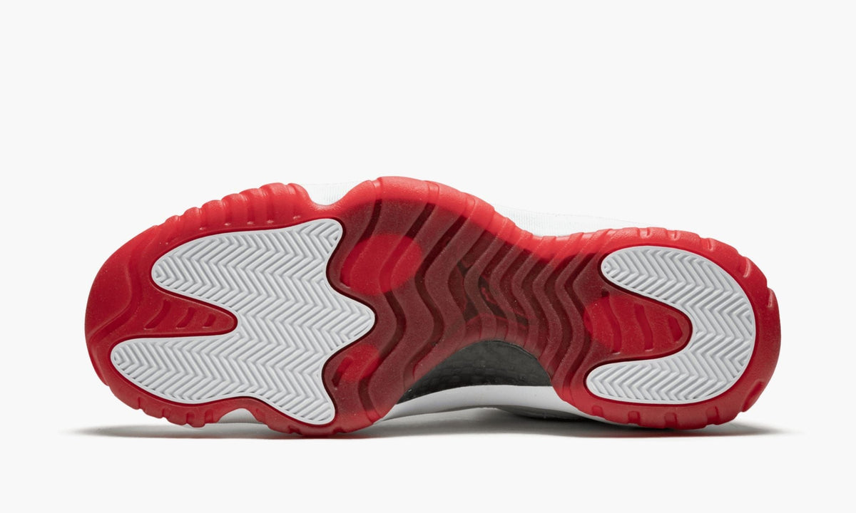 Air Jordan 11 Retro Low White/Varsity in Red - product image from the listing.