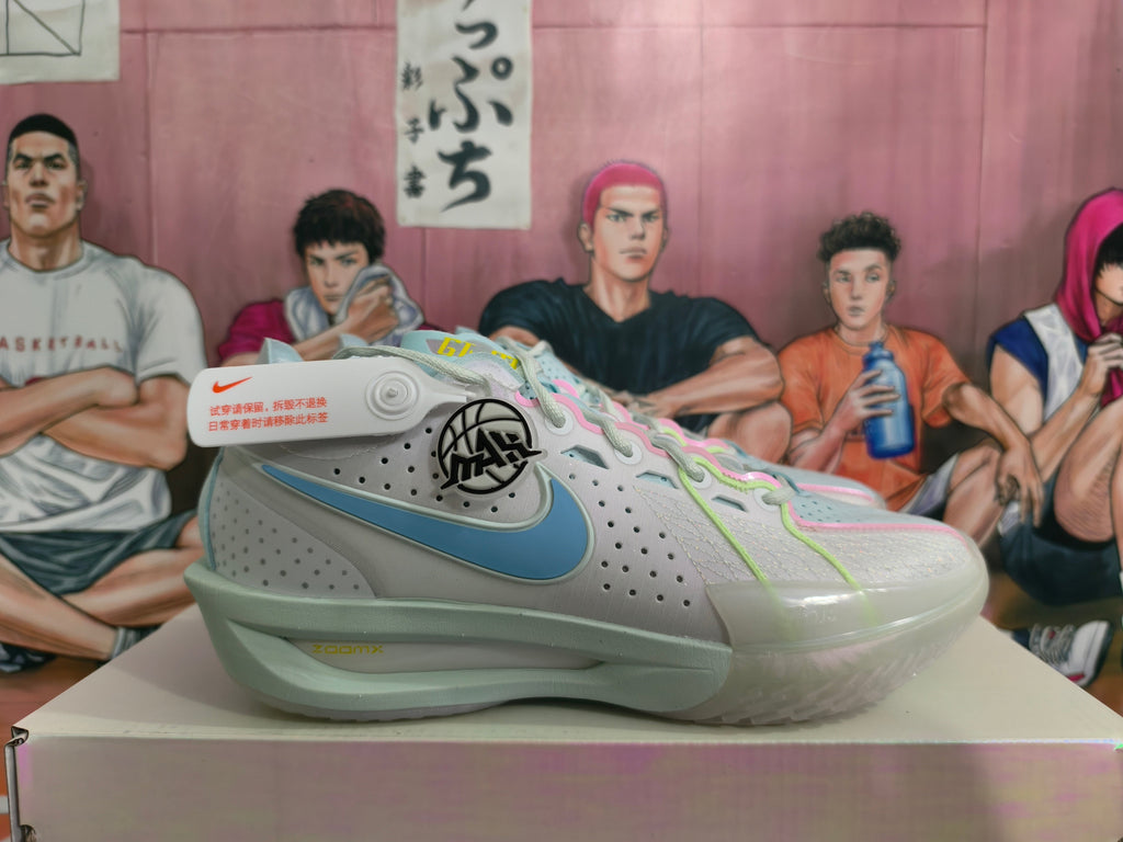 Light Gray and Blue Nike Basketball Shoes - product image from the listing.