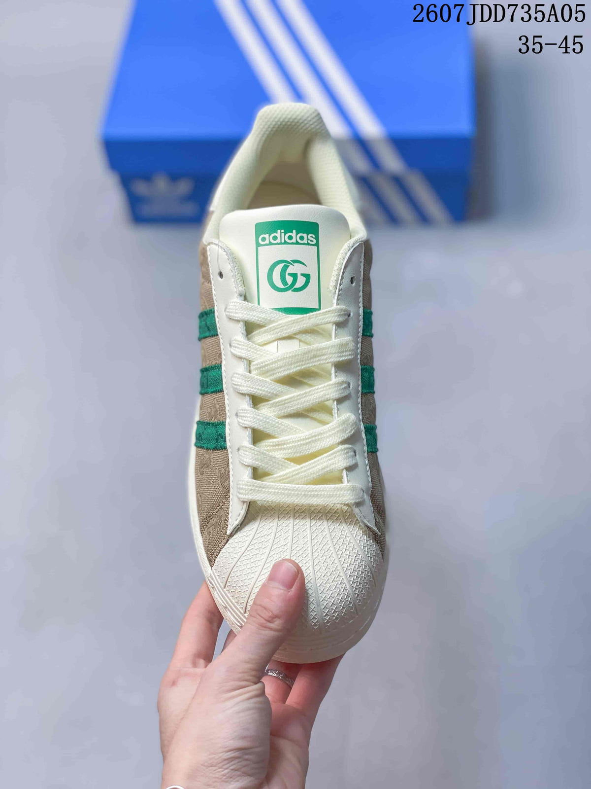 adidas Superstar Trainers Beige Green Shell-Toe Style 2607JDD735A05 - product image from the listing.