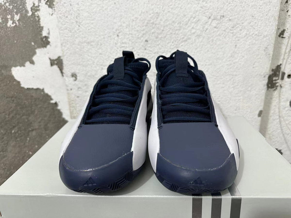 Navy and White Adidas Basketball Shoes - product image from the listing.